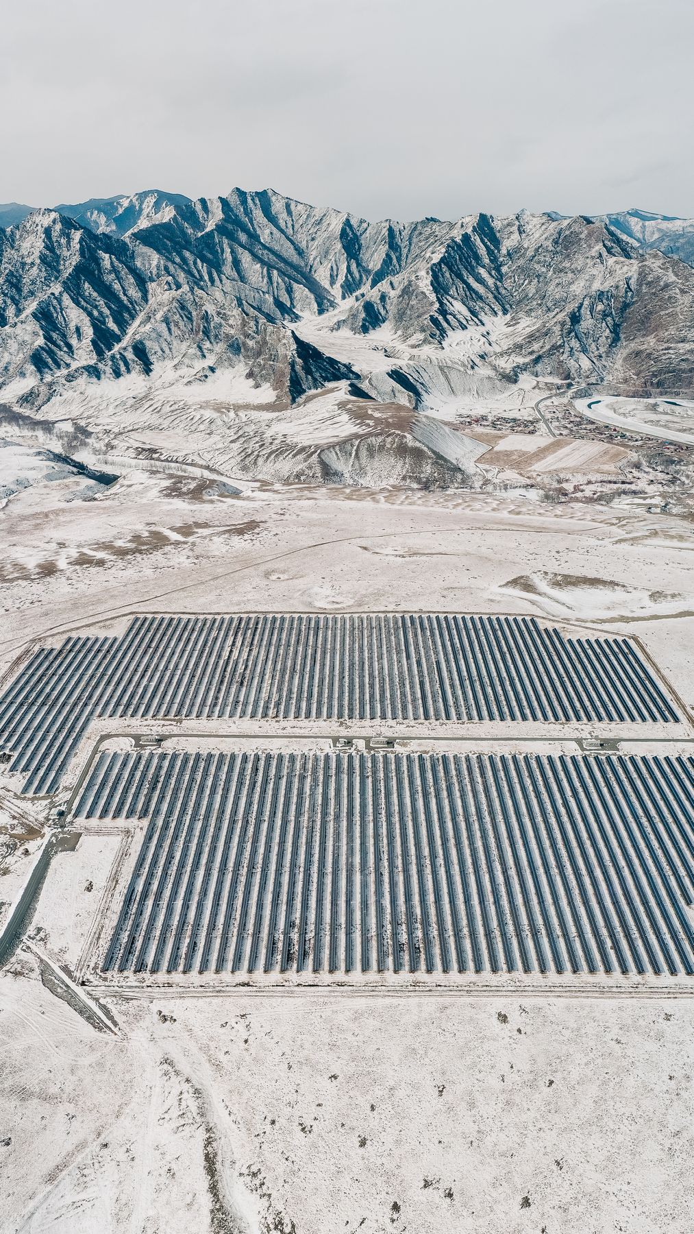 Photovoltaic solar panel on a Castilian plain with mountains in the background